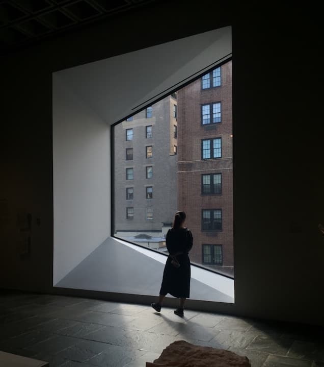 Person walking through the New York MET.